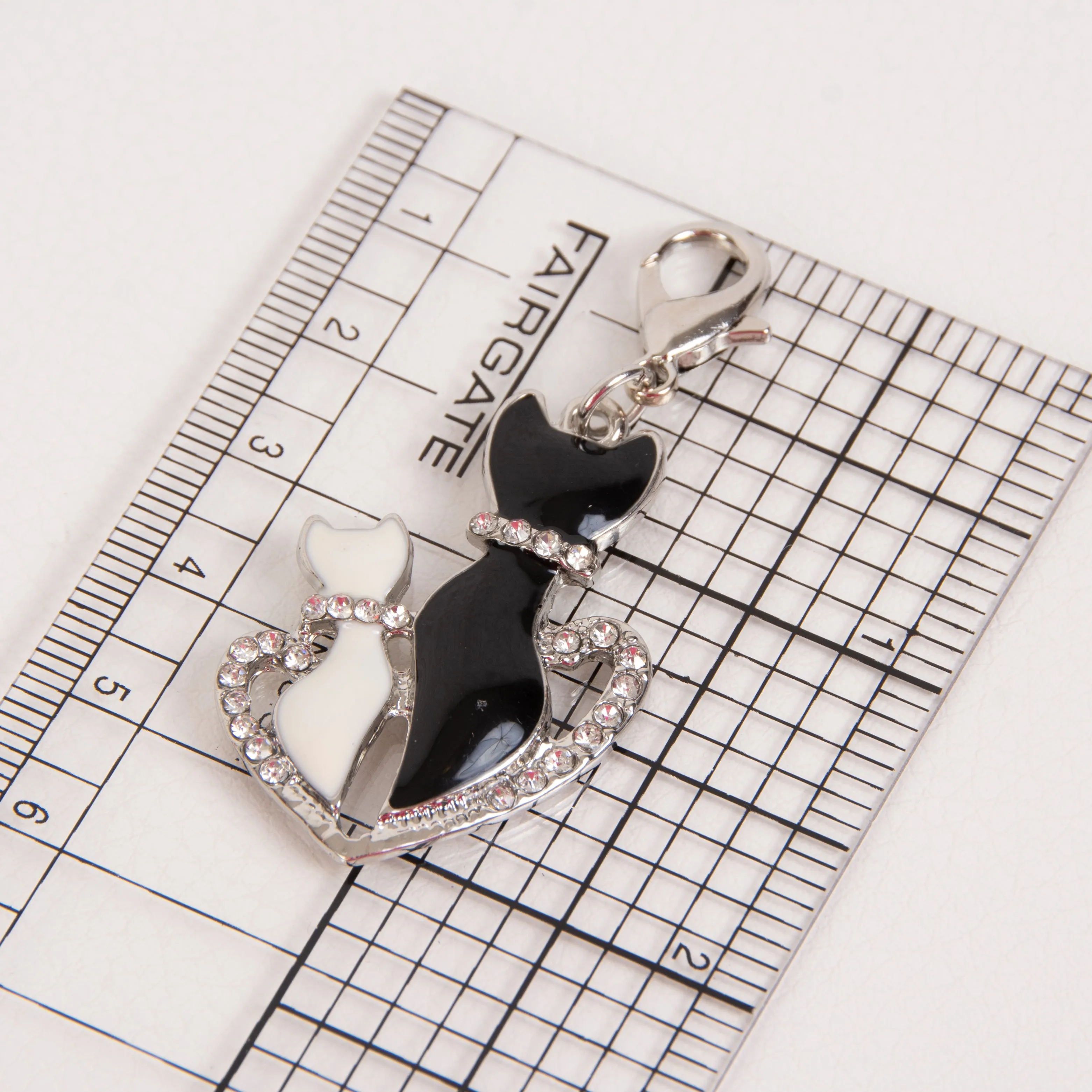 Elegant Cat Charm with Two Enamel Cats in Rhinestone Heart