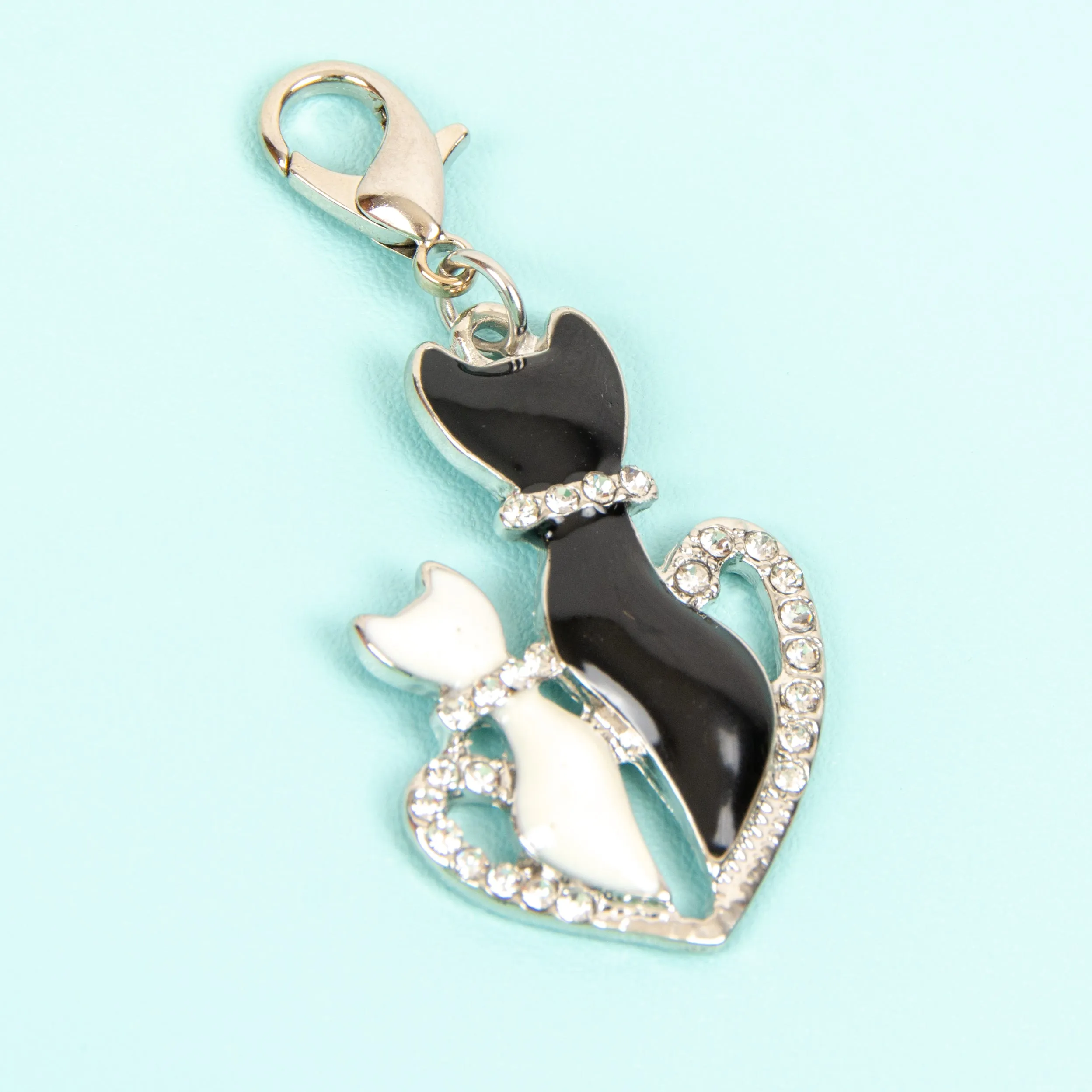 Elegant Cat Charm with Two Enamel Cats in Rhinestone Heart